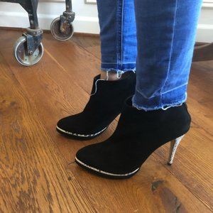 Black faux suede booties a faux snakeskin heel